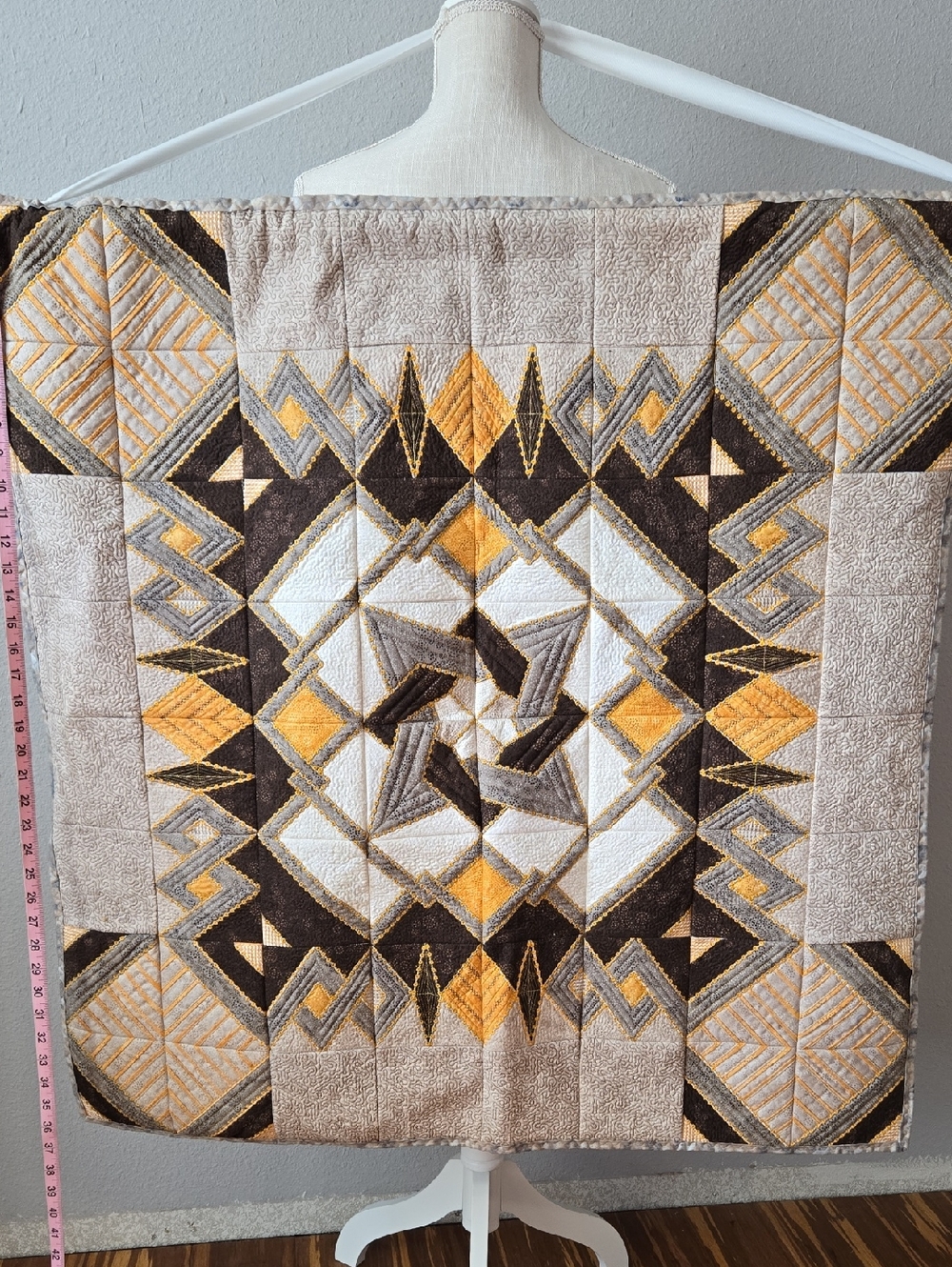 Geometric Patchwork Quilt in Gold, Brown, Cream